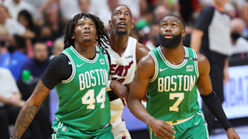 MIAMI, FLORIDA - MAY 19: Robert Williams III #44 and Jaylen Brown #7 of the Boston Celtics battle for a rebound with Bam Adebayo #13 of the Miami Heat in Game Two of the 2022 NBA Playoffs Eastern Conference Finals at FTX Arena on May 19, 2022 in Miami, Florida. NOTE TO USER: User expressly acknowledges and agrees that, by downloading and or using this photograph, User is consenting to the terms and conditions of the Getty Images License Agreement. (Photo by Michael Reaves/Getty Images)