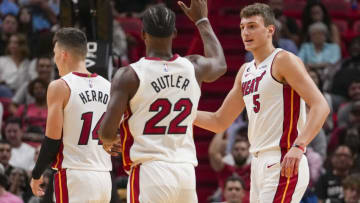 Nikola Jovic #5 of the Miami Heat is congratulated by Jimmy Butler #22 (Photo by Eric Espada/Getty Images)
