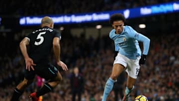 MANCHESTER, ENGLAND - DECEMBER 03: Leroy Sane of Manchester City and Pablo Zabaleta of West Ham United in action during the Premier League match between Manchester City and West Ham United at Etihad Stadium on December 3, 2017 in Manchester, England. (Photo by Clive Brunskill/Getty Images)
