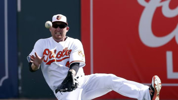 Mar 10, 2016; Sarasota, FL, USA; Baltimore Orioles right fielder Mark Trumbo (45) catches a pop fly against the New York Yankees during the fifth inning at Ed Smith Stadium. Mandatory Credit: Butch Dill-USA TODAY Sports