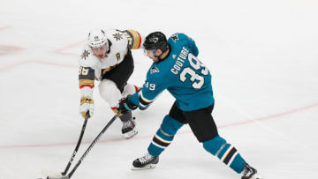 SAN JOSE, CA - APRIL 23: Nate Schmidt #88 of the Vegas Golden Knights competes for the puck against Logan Couture #39 of the San Jose Sharks in Game Seven of the Western Conference First Round during the 2019 NHL Stanley Cup Playoffs at SAP Center on April 23, 2019 in San Jose, California. (Photo by Lachlan Cunningham/Getty Images)