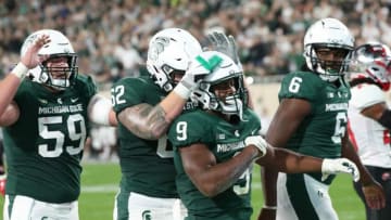 Michigan State Spartans running back Kenneth Walker III scores against the Western Kentucky Hilltoppers Saturday, Oct. 02, 2021.Msu Wku