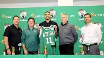 WALTHAM, MA- JUNE 23: Jayson Tatum #11 of the Boston Celtics holds his jersey as he poses for a picture with Wyc Grousbeck, Stephen Pagliuca, Brad Stevens and Danny Ainge of the Boston Celtics during a introductory press conference on June 23 in Waltham, Massachusetts. NOTE TO USER: User expressly acknowledges and agrees that, by downloading and/or using this Photograph, user is consenting to the terms and conditions of the Getty Images License Agreement. Mandatory Copyright Notice: Copyright 2017 NBAE (Photo by Chris Marion/NBAE via Getty Images)