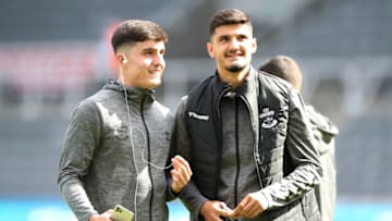 NEWCASTLE UPON TYNE, ENGLAND - AUGUST 28: Tino Livramento (L) and Armando Broja of Southampton looks on ahead of the Premier League match between Newcastle United and Southampton at St. James Park on August 28, 2021 in Newcastle upon Tyne, England. (Photo by Ian MacNicol/Getty Images)