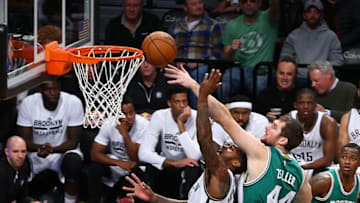 NEW YORK, USA - NOVEMBER 24: Sean Kilpatrick (6) of Brooklyn Nets in action against Tyler Zeller (44) of Boston Celtic during the NBA match between Brooklyn Nets and Boston Celtics at the Barclays Center in New York City, NY, United States on November 24, 2016. (Photo by Volkan Furuncu/Anadolu Agency/Getty Images)