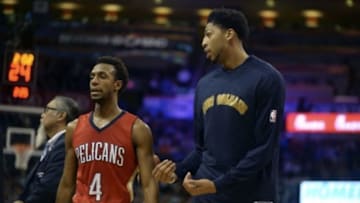 Nov 18, 2015; Oklahoma City, OK, USA; New Orleans Pelicans forward Anthony Davis (23) talks to guard Ish Smith (4) during a timeout from action against the Oklahoma City Thunder during the second quarter at Chesapeake Energy Arena. Mandatory Credit: Mark D. Smith-USA TODAY Sports
