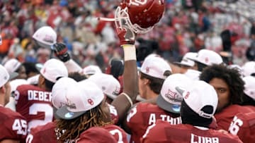 Dec 3, 2016; Norman, OK, USA; The Oklahoma Sooners celebrate winning the Big 12 Conference Championship after defeating the Oklahoma State Cowboys at Gaylord Family - Oklahoma Memorial Stadium. Mandatory Credit: Mark D. Smith-USA TODAY Sports