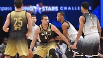 Feb 12, 2016; Toronto, Ontario, CAN; World player Trey Lyles (41) dribbles the ball as U.S player Rodney Hood (5) defends in the first half during the Rising Stars Challenge basketball game at Air Canada Centre. Mandatory Credit: Bob Donnan-USA TODAY Sports