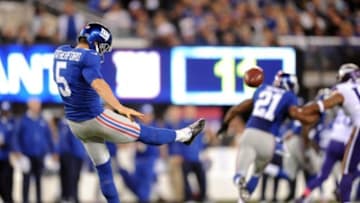 Oct 21, 2013; East Rutherford, NJ, USA; New York Giants punter Steve Weatherford (5) punts against the Minnesota Vikings at MetLife Stadium. The Giants won the game 23-7. Mandatory Credit: Joe Camporeale-USA TODAY Sports