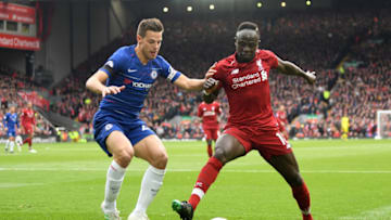 LIVERPOOL, ENGLAND - APRIL 14: Sadio Mane of Liverpool shields the ball from Cesar Azpilicueta of Chelsea during the Premier League match between Liverpool FC and Chelsea FC at Anfield on April 14, 2019 in Liverpool, United Kingdom. (Photo by Michael Regan/Getty Images)