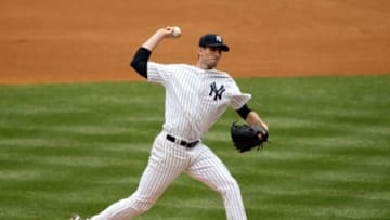 Jul 19, 2014; Bronx, NY, USA; New York Yankees starting pitcher Brandon McCarthy (38) pitches against the Cincinnati Reds during the fourth inning at Yankee Stadium. Mandatory Credit: Adam Hunger-USA TODAY Sports