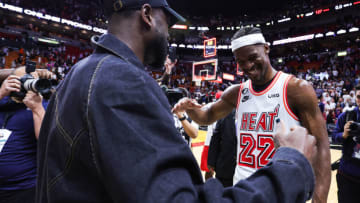 Dwyane Wade and Jimmy Butler #22 of the Miami Heat meet on the court after a game between the Miami Heat and New York Knicks (Photo by Megan Briggs/Getty Images)