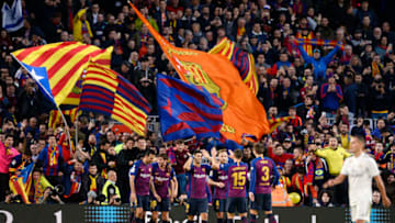 Barcelona's Uruguayan forward Luis Suarez (C) celebrates his second goal with teammates during the Spanish league football match between FC Barcelona and Real Madrid CF at the Camp Nou stadium in Barcelona on October 28, 2018. (Photo by Josep LAGO / AFP) (Photo credit should read JOSEP LAGO/AFP/Getty Images)