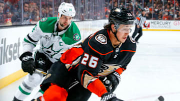 ANAHEIM, CA - APRIL 6: Brandon Montour #26 of the Anaheim Ducks skates with the puck with pressure from Jamie Benn #14 of the Dallas Stars during the second period of the game at Honda Center on April 6, 2018 in Anaheim, California. (Photo by Debora Robinson/NHLI via Getty Images)