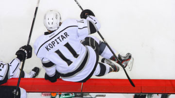 WINNIPEG, CANADA - DECEMBER 29: Anze Kopitar #11 of the Los Angeles Kings jumps over the boards during first period action against the Winnipeg Jets at the MTS Centre on December 29, 2011 in Winnipeg, Manitoba, Canada. The Jets defeated the Kings 1-0 in overtime. (Photo by Jonathan Kozub/NHLI via Getty Images)