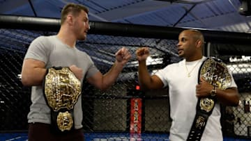 LAS VEGAS, NV - FEBRUARY 02: (L-R) Stipe Miocic and Daniel Cormier bump fists during the The Ultimate Fighter: Undefeated Cast