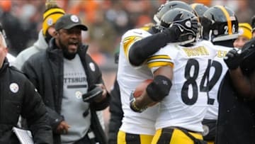 Nov 24, 2013; Cleveland, OH, USA; Pittsburgh Steelers wide receiver Antonio Brown (84) and Pittsburgh Steelers quarterback Ben Roethlisberger (7) celebrate a second quarter touchdown against the Cleveland Browns at FirstEnergy Stadium. Mandatory Credit: Ken Blaze-USA TODAY Sports