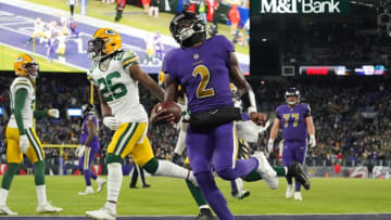 NFL Power Rankings; Baltimore Ravens quarterback Tyler Huntley (2) scores a touchdown during the fourth quarter against the Green Bay Packers at M&T Bank Stadium. Mandatory Credit: Mitch Stringer-USA TODAY Sports