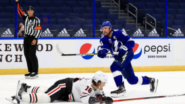 TAMPA, FLORIDA - JANUARY 13: Steven Stamkos #91 of the Tampa Bay Lightning looks to pass during a game against the Chicago Blackhawks on opening night of the 2020-21 NHL season at Amalie Arena on January 13, 2021 in Tampa, Florida. (Photo by Mike Ehrmann/Getty Images)