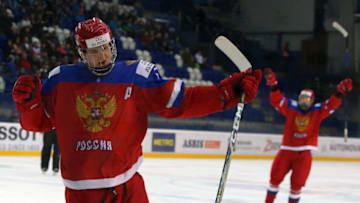 POPRAD, SLOVAKIA - APRIL 23, 2017: Russia's Dmitry Samorukov (front) celebrates a goal scored against Sweden in their 2017 IIHF World U18 Championship ice hockey bronze medal match at the Poprad Ice Stadium. Russia won the game 3-0. Yelena Rusko/TASS (Photo by Yelena Rusko\TASS via Getty Images)