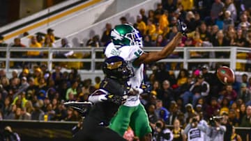 Auburn footballNorth Texas runningback Jyaire Shorter (16) tries to catch a pass while Southern Miss defensive back Ty Williams tackles him during the game Saturday, Oct. 12, 2019.Jyaire Shorter