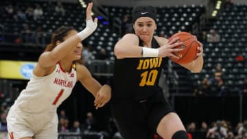 INDIANAPOLIS, IN - MARCH 10: Iowa Hawkeyes forward Megan Gustafson (10) drives around Maryland Terrapins  forward Shakira Austin (1) during the Women's B1G Tournament championship game between the Maryland Terrapins and the Iowa Hawkeyes on March 10, 2019 at Bankers Life Fieldhouse, in Indianapolis Indiana.(Photo by Jeffrey Brown/Icon Sportswire via Getty Images)