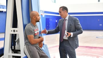 CAMDEN, NJ- SEPTEMBER 23: Jerryd Bayless of the Philadelphia 76ers and President of Basketball Operations Bryan Colangelo talk at the official opening of The Philadelphia 76ers Training Complex on September 23, 2016 in Camden, New Jersey. NOTE TO USER: User expressly acknowledges and agrees that, by downloading and/or using this Photograph, user is consenting to the terms and conditions of the Getty Images License Agreement. Mandatory Copyright Notice: Copyright 2016 NBAE (Photo by Jesse D. Garrabrant/NBAE via Getty Images)