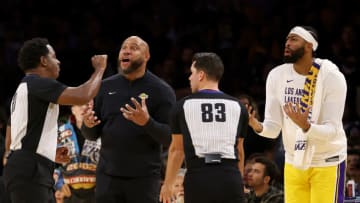 LOS ANGELES, CALIFORNIA - NOVEMBER 01: Head coach Darvin Ham and Anthony Davis #3 of the Los Angeles Lakers argue with referee Mitchell Ervin #27 during the fourth quarter against the Los Angeles Clippers at Crypto.com Arena on November 01, 2023 in Los Angeles, California. NOTE TO USER: User expressly acknowledges and agrees that, by downloading and or using this photograph, User is consenting to the terms and conditions of the Getty Images License Agreement. (Photo by Katelyn Mulcahy/Getty Images)