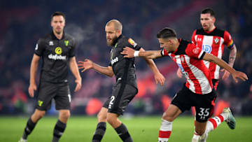 SOUTHAMPTON, ENGLAND - DECEMBER 04: Teemu Pukki of Norwich City battles for possession with Jan Bednarek of Southampton during the Premier League match between Southampton FC and Norwich City at St Mary's Stadium on December 04, 2019 in Southampton, United Kingdom. (Photo by Dan Mullan/Getty Images)