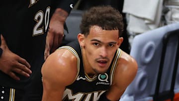 ATLANTA, GEORGIA - JULY 03: Trae Young #11 of the Atlanta Hawks look on in the final seconds of the team's series loss to the Milwaukee Bucks in Game Six of the Eastern Conference Finals at State Farm Arena on July 03, 2021 in Atlanta, Georgia NOTE TO USER: User expressly acknowledges and agrees that, by downloading and or using this photograph, User is consenting to the terms and conditions of the Getty Images License Agreement. (Photo by Kevin C. Cox/Getty Images)