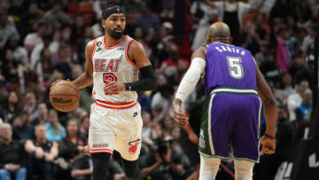 Miami Heat guard Gabe Vincent (2) brings the ball up the court against Milwaukee Bucks guard Jevon Carter (5)( Jim Rassol-USA TODAY Sports)