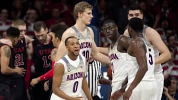 Jan 5, 2017; Tucson, AZ, USA; Arizona Wildcats guard Parker Jackson-Cartwright (0) and guard Rawle Alkins (1) (middle) look to the bench during the first half against the Utah Utes at McKale Center. Mandatory Credit: Casey Sapio-USA TODAY Sports