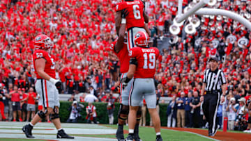 ATHENS, GA - SEPTEMBER 10: Kenny McIntosh #6 of the Georgia Bulldogs reacts after a touchdown in the first half against the Samford Bulldogs at Sanford Stadium on September 10, 2022 in Atlanta, Georgia. (Photo by Todd Kirkland/Getty Images)