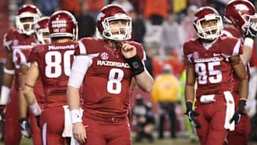 Nov 22, 2014; Fayetteville, AR, USA; Arkansas Razorbacks quarterback Austin Allen (8) and wide receiver Demetrius Wilson (85) look toward the sideline in the game against the Ole Miss Rebels at Donald W. Reynolds Razorback Stadium. Arkansas defeated Mississippi 30-0. Mandatory Credit: Nelson Chenault-USA TODAY Sports