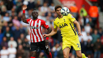 SOUTHAMPTON, ENGLAND - APRIL 25: Sadio Mane of Southampton and Federico Fazio of Spurs compete for the ball during the Barclays Premier League match between Southampton and Tottenham Hotspur at St Mary's Stadium on April 25, 2015 in Southampton, England. (Photo by Steve Bardens/Getty Images)