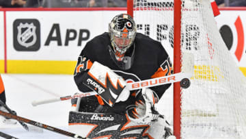 Feb 24, 2023; Philadelphia, Pennsylvania, USA; Philadelphia Flyers goaltender Carter Hart (79) clears the puck to the corner against the Montreal Canadiens during the second period at Wells Fargo Center. Mandatory Credit: Eric Hartline-USA TODAY Sports