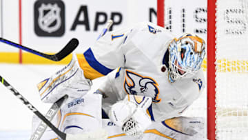 Jan 14, 2023; Nashville, Tennessee, USA; Buffalo Sabres goaltender Ukko-Pekka Luukkonen (1) makes a save during the third period against the Nashville Predators at Bridgestone Arena. Mandatory Credit: Christopher Hanewinckel-USA TODAY Sports