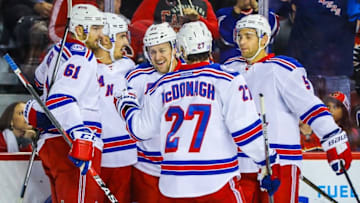Nov 12, 2016; Calgary, Alberta, CAN; New York Rangers center Derek Stepan (21) celebrates his goal with teammates against the Calgary Flames during the first period at Scotiabank Saddledome. Mandatory Credit: Sergei Belski-USA TODAY Sports