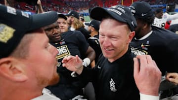 ATLANTA, GA - JANUARY 01: Head coach Scott Frost of the UCF Knights celebrates after defeating the Auburn Tigers 34-27 to win the Chick-fil-A Peach Bowl at Mercedes-Benz Stadium on January 1, 2018 in Atlanta, Georgia. (Photo by Kevin C. Cox/Getty Images)