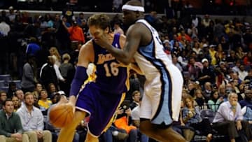 Dec 17, 2013; Memphis, TN, USA; Memphis Grizzlies power forward Zach Randolph (50) fouls Los Angeles Lakers center Pau Gasol (16) during the fourth quarter at FedExForum. Los Angeles Lakers defeat the Memphis Grizzlies 96-92 Mandatory Credit: Justin Ford-USA TODAY Sports