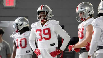 Mar 9, 2023; Columbus, Ohio, USA; Ohio State Buckeyes defensive back Andrew Moore (39) smiles during spring football practice at the Woody Hayes Athletic Center. Mandatory Credit: Adam Cairns-The Columbus DispatchFootball Buckeyes Spring Football