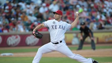 ARLINGTON, TX - JULY 27: Ryan Feierabend #68 of the Texas Rangers throws in the fifth inning against the Oakland Athletics at Globe Life Park in Arlington on July 27, 2014 in Arlington, Texas. (Photo by Rick Yeatts/Getty Images)
