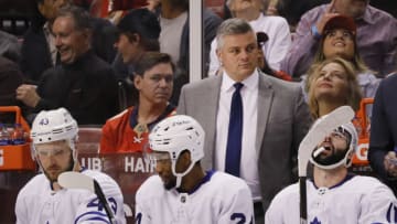 Apr 23, 2022; Sunrise, Florida, USA; Toronto Maple Leafs head coach Sheldon Keefe watches from the bench during the game against the Florida Panthers at FLA Live Arena. Mandatory Credit: Sam Navarro-USA TODAY Sports