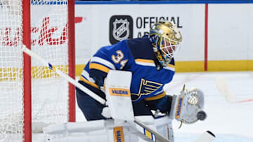 ST. LOUIS, MO - MARCH 27: Jake Allen #34 of the St. Louis Blues makes a save on a shot from the San Jose Sharks at Scottrade Center on March 27, 2018 in St. Louis, Missouri. (Photo by Joe Puetz/NHLI via Getty Images)