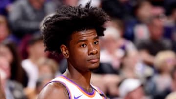 PHOENIX, AZ - DECEMBER 26: Josh Jackson #20 of the Phoenix Suns looks on during the game against the Memphis Grizzlies on December 26, 2017 at Talking Stick Resort Arena in Phoenix, Arizona. NOTE TO USER: User expressly acknowledges and agrees that, by downloading and or using this photograph, user is consenting to the terms and conditions of the Getty Images License Agreement. Mandatory Copyright Notice: Copyright 2017 NBAE (Photo by Barry Gossage/NBAE via Getty Images)