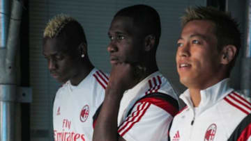 Aug 2, 2014; Charlotte, NC, USA; Milan forward Mario Balotelli (45), Milan defender Cristian Zapata (17) and Milan forward Keisuke Honda (10) at Bank of America Stadium. Mandatory Credit: Jim Dedmon-USA TODAY Sports