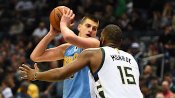 MILWAUKEE, WI - MARCH 01: Nikola Jokic #15 of the Denver Nuggets works against Greg Monroe #15 of the Milwaukee Bucks during a game at the BMO Harris Bradley Center on March 1, 2017 in Milwaukee, Wisconsin. NOTE TO USER: User expressly acknowledges and agrees that, by downloading and or using this photograph, User is consenting to the terms and conditions of the Getty Images License Agreement. (Photo by Stacy Revere/Getty Images)