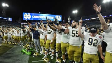 The Notre Dame Fighting Irish along with Notre Dame Fighting Irish head coach Marcus Freeman sing the School's Alma mater after their victory over South Carolina in the Gator Bowl. The University of Notre Dame Fighting Irish took on the University of South Carolina Gamecocks in the TaxSlayer Gator Bowl game in Jacksonville, Florida's TIAA Bank Field Friday, December 30, 2022. The first half ended with South Carolina holding a 24 to 17 lead but Notre Dame came back and with a late fourth quarter touchdown, won the game 45 to 38. [Bob Self/Florida Times-Union]Jki 123022 Bs Gatorbowl 08Syndication Florida Times Union