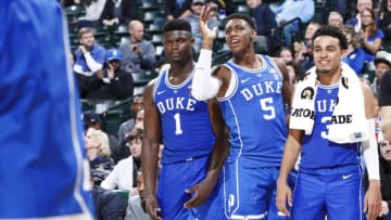 INDIANAPOLIS, IN - NOVEMBER 06: Zion Williamson #1, RJ Barrett #5 and Tre Jones #3 of the Duke Blue Devils react from the bench during the State Farm Champions Classic against the Kentucky Wildcats at Bankers Life Fieldhouse on November 6, 2018 in Indianapolis, Indiana. Duke defeated Kentucky 118-84. (Photo by Joe Robbins/Getty Images)