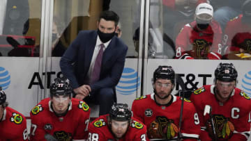 Chicago Blackhawks head coach Jeremy Colliton behind the bench during the second period at United Center. Mandatory Credit: David Banks-USA TODAY Sports